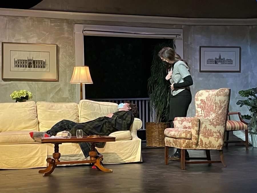 Sophomore Eamon McNulty (left) plays a character faking illness to distract his wife (senior Tui Brattain, right) from his extramarital affair.