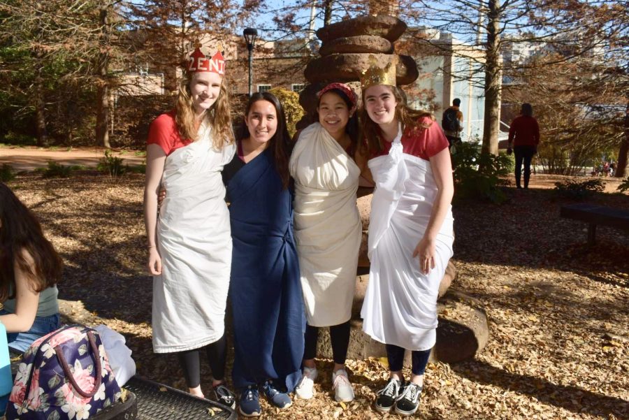 TOGA FRIDAY: (From left to right) Seniors Eva Flom, Zoe Chan, Avery
Harlicka and Annie Laster broke out the bedsheets for Senior Toga Day.