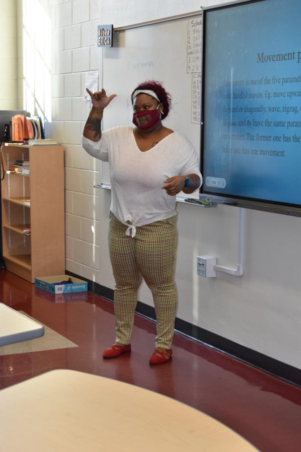 American Sign Language teacher Erica Miley wears a clear mask so students can see her mouth move, and better understand what shes teaching during class.