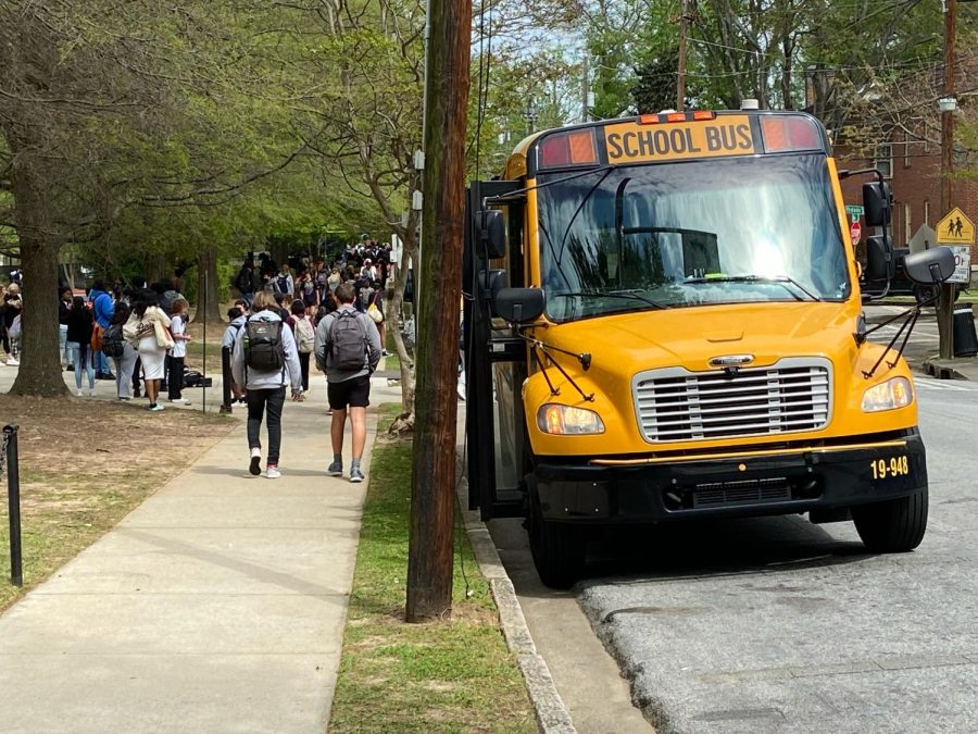 LEAVING SCHOOL: Students walk down Eighth Street to their respective buses after school. During this school year, buses have often not shown up, leaving students without a way home.