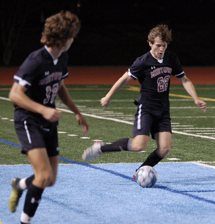 Junior+defender+Zach+Spangler+passes+the+ball+during+the+Knights+8-0+playoff+win+against+Apalachee.