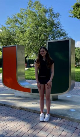 Jory Richardson smiles infront of the U at the University of Miami during her official visit. 
