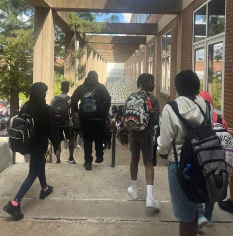 Classes were near deserted yesterday following a school shooting threat, and students received excused absences. Today, the building was full with news that the threat is likely a hoax. 