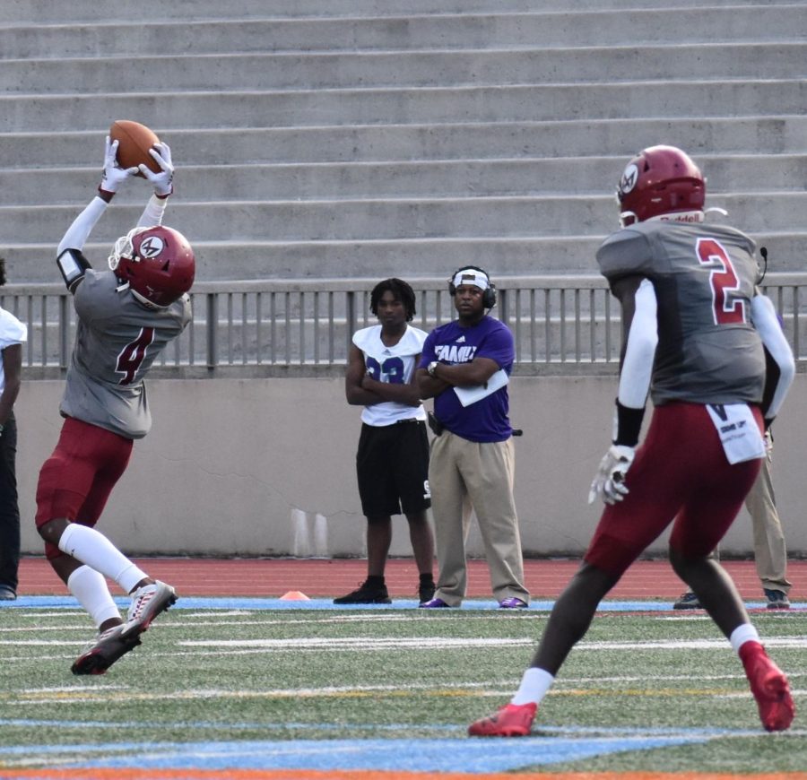 Kenari Tigner catches the ball after KIPP Atlanta Collegiate was forced to punt. The Knights beat Kipp 33-10 in the first game of the season.
