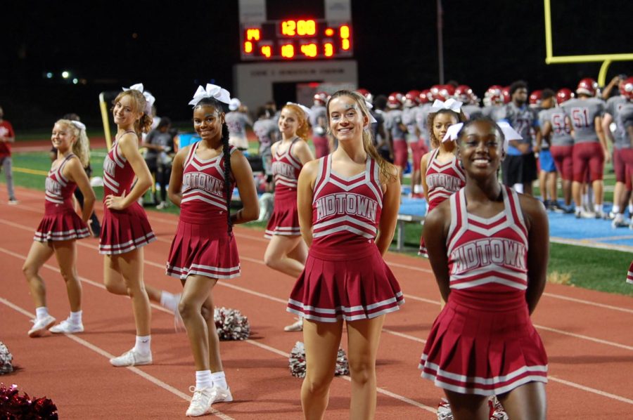 The Midtown knights cheerleading squad supporting the Knights on August 19th. The Knights beat Kipp 33-10 in the first game of the season.