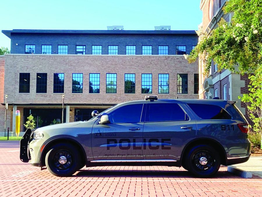 The APS Police car assigned to Midtowns resource officers parks outside the school daily. Officers use the car throughout the school day, as needed. 