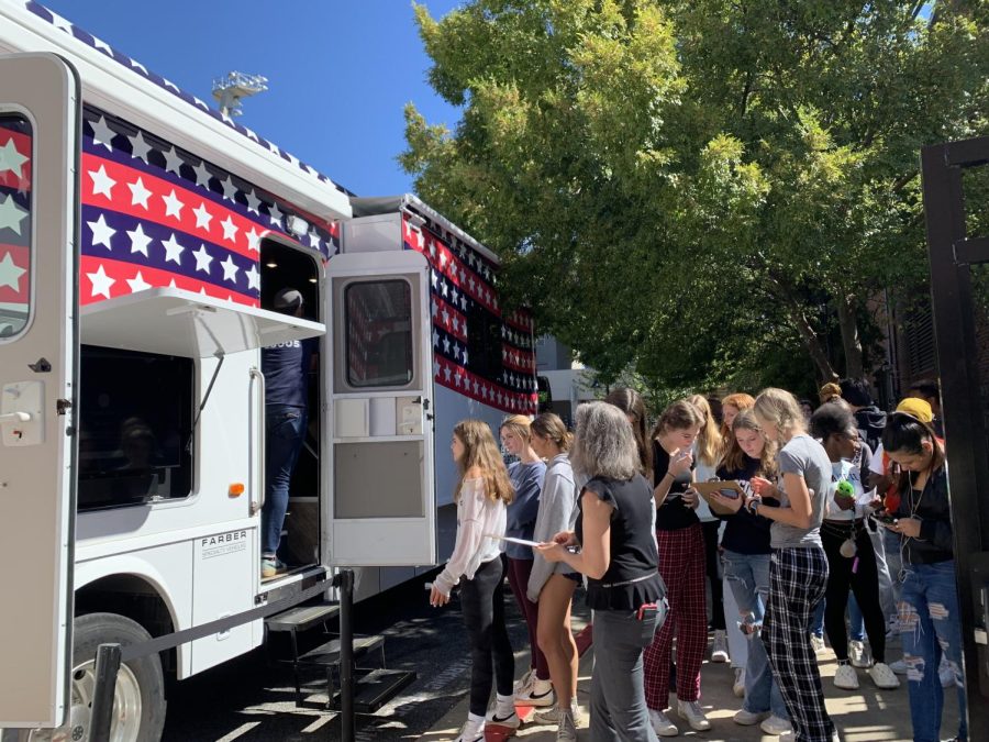 After filling out voter registration forms for those who were 17.5 or older, students were able to go inside the Fulton County bus where they learned what its like to place an actual ballot.