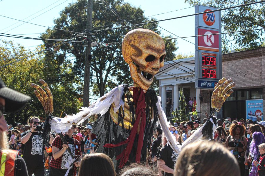 The Little 5 Points Halloween Parade returns to the community after a three-year hiatus. Rainy Day Retrieval Freak Show’s ginormous skeleton puppet spread across the road. 
