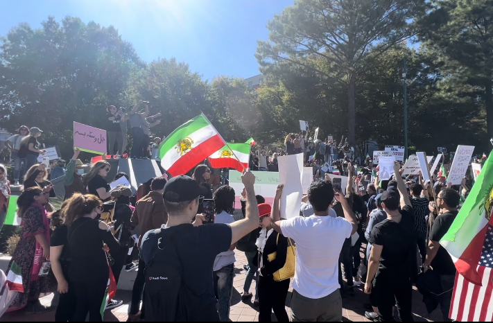 Protestors in opposition to Irans regime stand in downtown Atlanta on Oct. 1. This was one of the several protests which occurred in cities around the world at the same time.
