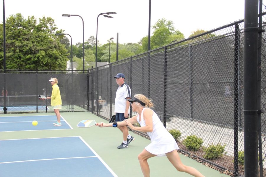 Pickleball players competing at Ansley Golf Club in a tournament for charity.