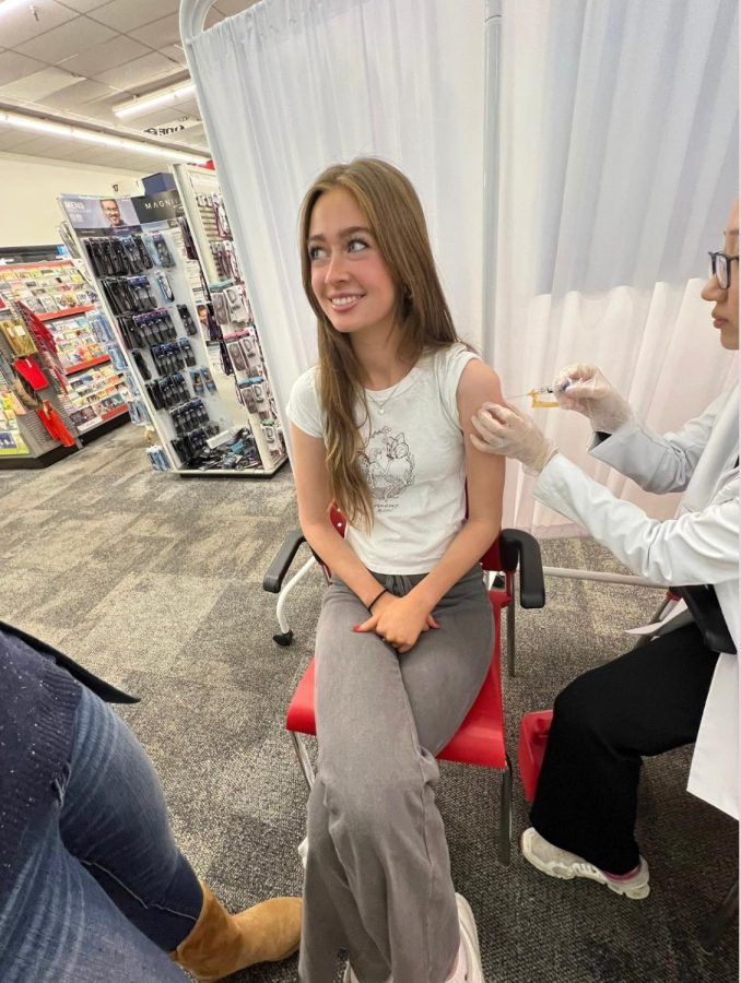 Junior Claire Diem receives her free flu vaccine from her local CVS