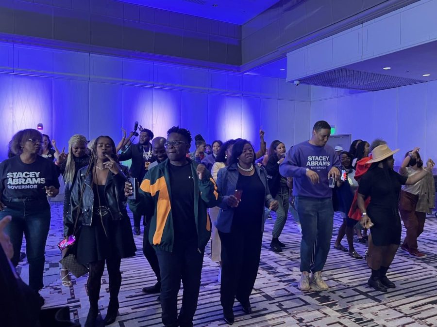Stacy Abrams supporters dance at her election night watch party. 