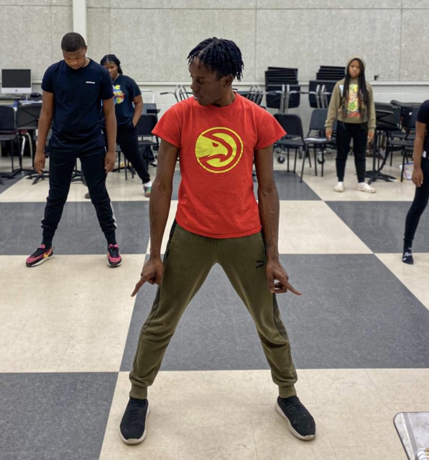 As the new head coach of color guard, Tre Griggs plans on continuing to grow the program through Winter Guard, a new activity he has been promoting through holding audition clinics.