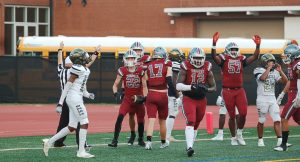 Junior Patrick Stouffer celebrates after scoring a touchdown in the Knights 24-15 win over BEST academy on Thursday Aug. 24.