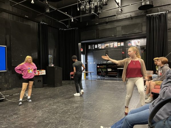 New theater teacher Madeline Willard directs a scene in her Theater Fundamentals class.