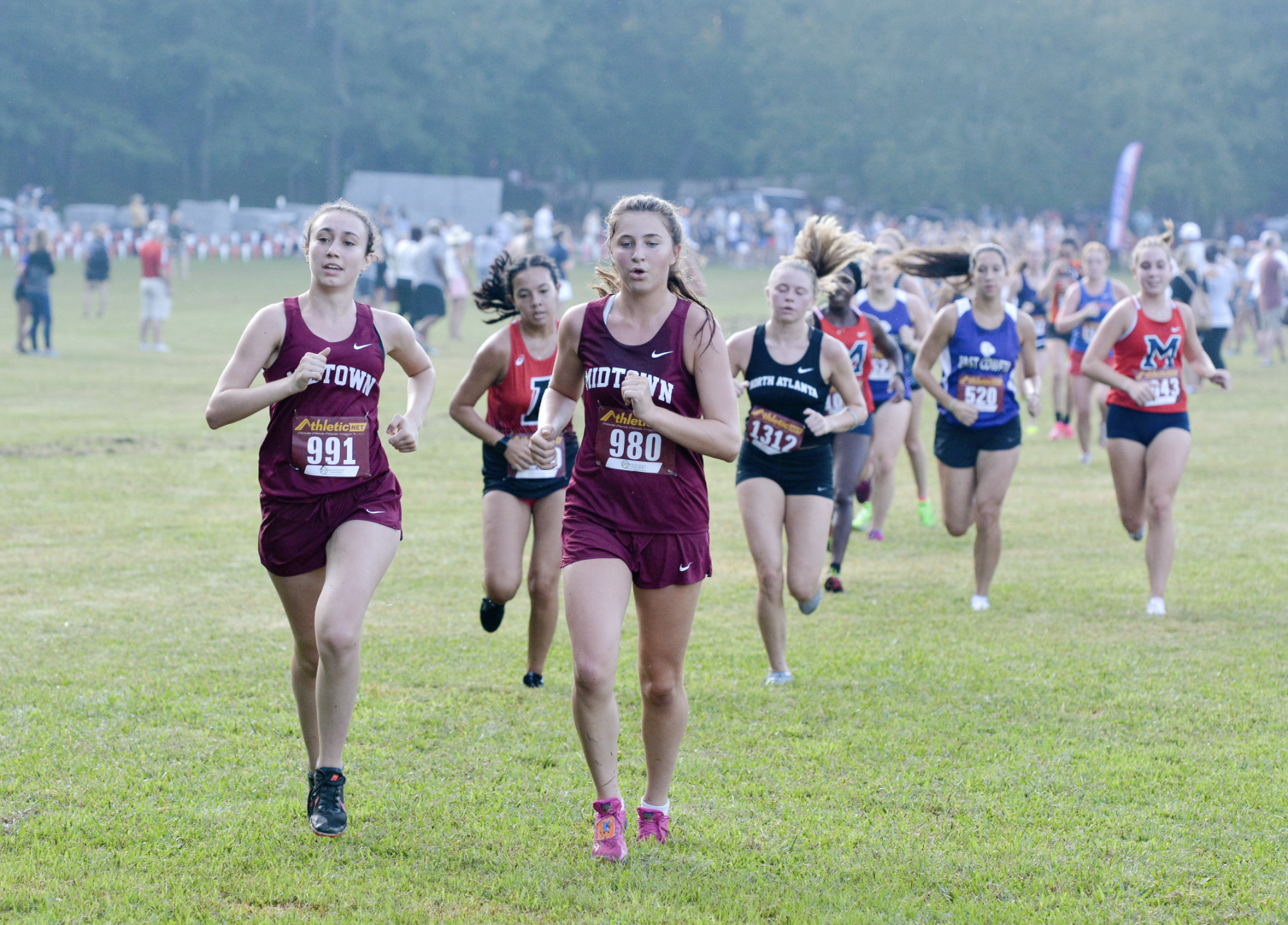Juniors Sierra Pape and Cate Barton run at the APS Championship where the Knights placed second. The Knights also placed second at the Region 5-AAAAA Championship meet and 12th at the 5A State Championship.