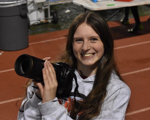 New school policy restricts on field sports photography to only school approved media sources such as Yearbook. 