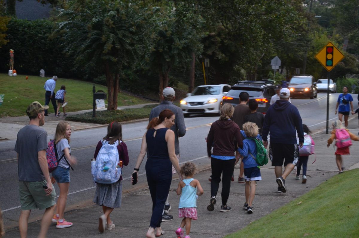 Families+walk+before+school+to+Morningside.+Georgias+private+school+vouchers+are+returning%2C+which+will+allow+parents+to+move+their+children+from+low-performing+public+schools+into+private+schools+or+homeschooling.