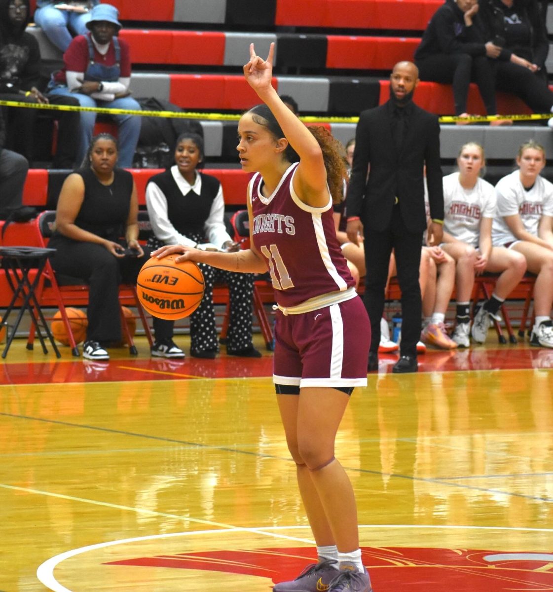 Senior guard Briaiah Lewis calls a play in the region championship game against Maynard-Jackson on Feb. 17. The Knights lost 56-44 and ended up second place in the region.