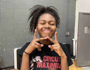Freshman Neveah Hambrick smiles at the end of basketball practice. 