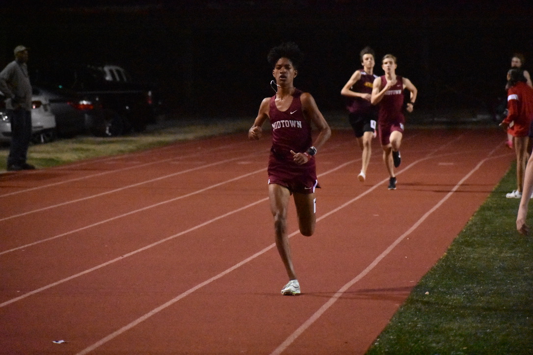 Sophomore Cameron Collier leads the 800 meter run in the Midtown Opener on Feb. 27. Collier hopes to improve his speed and set more records in the future.