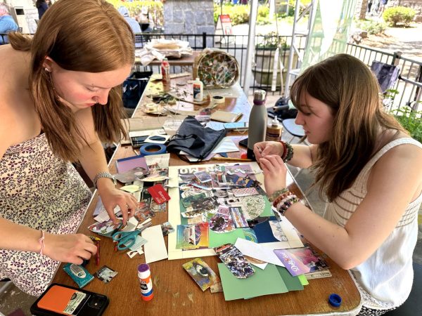 Teams of two participate in the Lillian Blades Collage competition. Students use materials they find at the Dogwood Festival, like flyers, maps, newspapers and leaves.