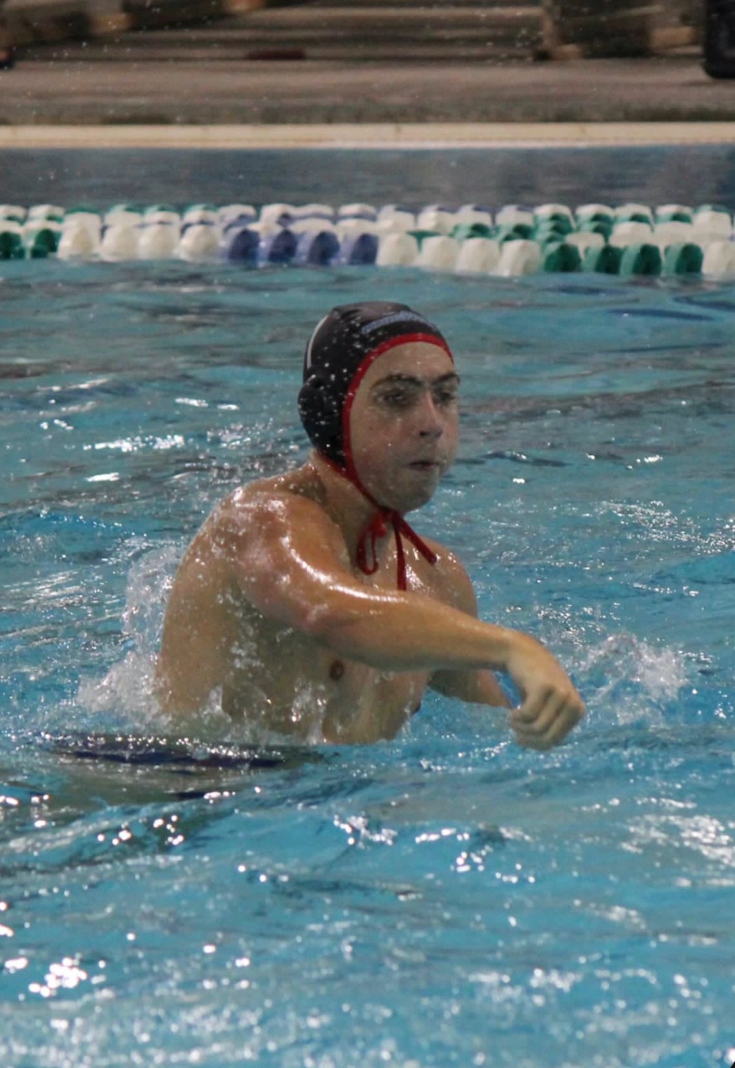 Senior Sawyer Maddox takes a shot during a water polo match. Maddox has been playing water polo since he was 10 years old, and in his high school career led the state in forced turnovers and got selected to represent the Southeast at Nationals. (Courtesy of Sawyer Maddox)