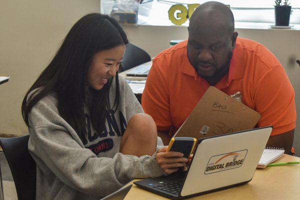 Robert Bass is helping improve financial literacy with students such as Gigi Highlander through assisting as the co-teacher in the 2B Advanced Financial Algebra class. One of the goals for the added course is that all students leave with a working budget they can refer to when making financial decisions.