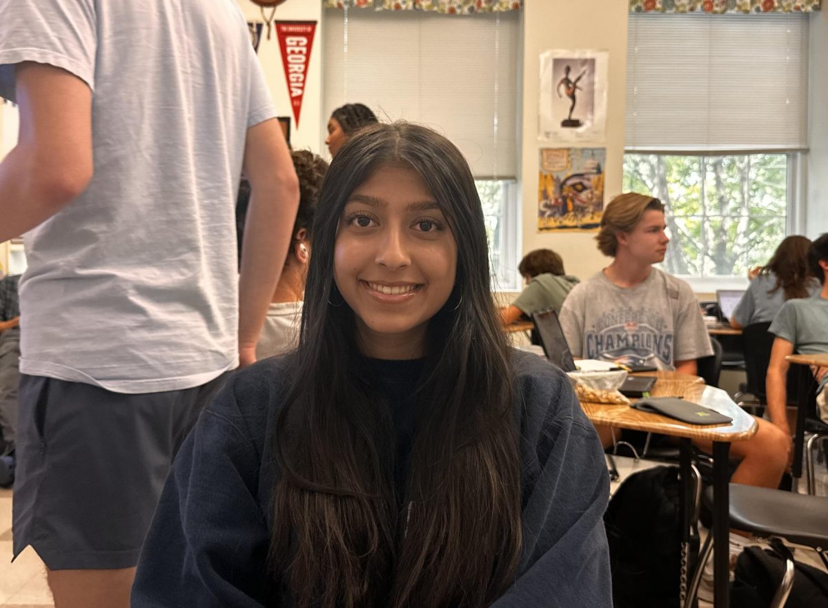 Bhatia smiles in after school AP U.S. History tutorial in Mrs. Van Atta's room.