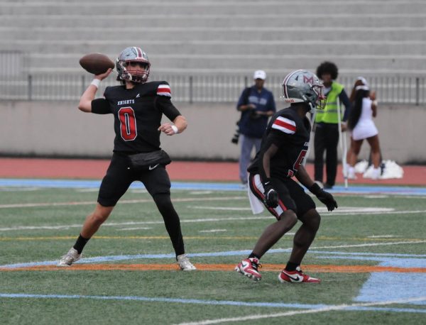 Senior quarterback Ethan Ward throws a pass in the Knights' first region game of the season against Charles Drew on Sept. 13. The Knights lost 19-0 and their overall record fell to 1-3.