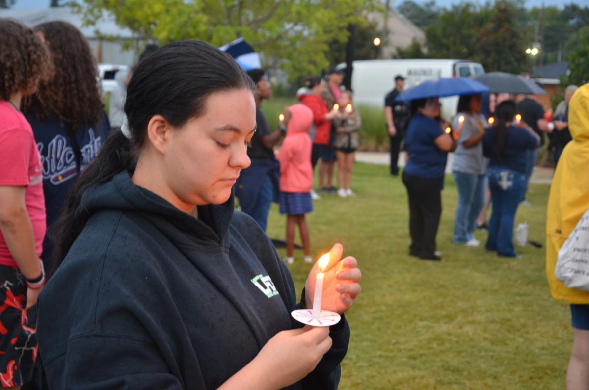 Brylie Adams [depicted] is a senior at Apalachee High School and attended the candlelight vigil. "I'm in band and so were the two students that died," Adams said. "I didn't know them personally but that is still scary."