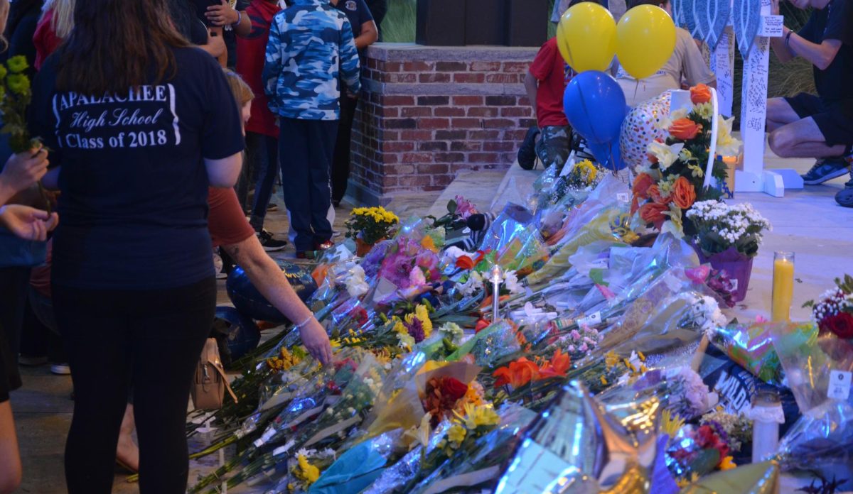 On Friday, Sept. 6, over 1,000 community members from Winder, Georgia attended a vigil at Jug Tavern Park. Attendees laid flowers in front of crosses for the four dead. 