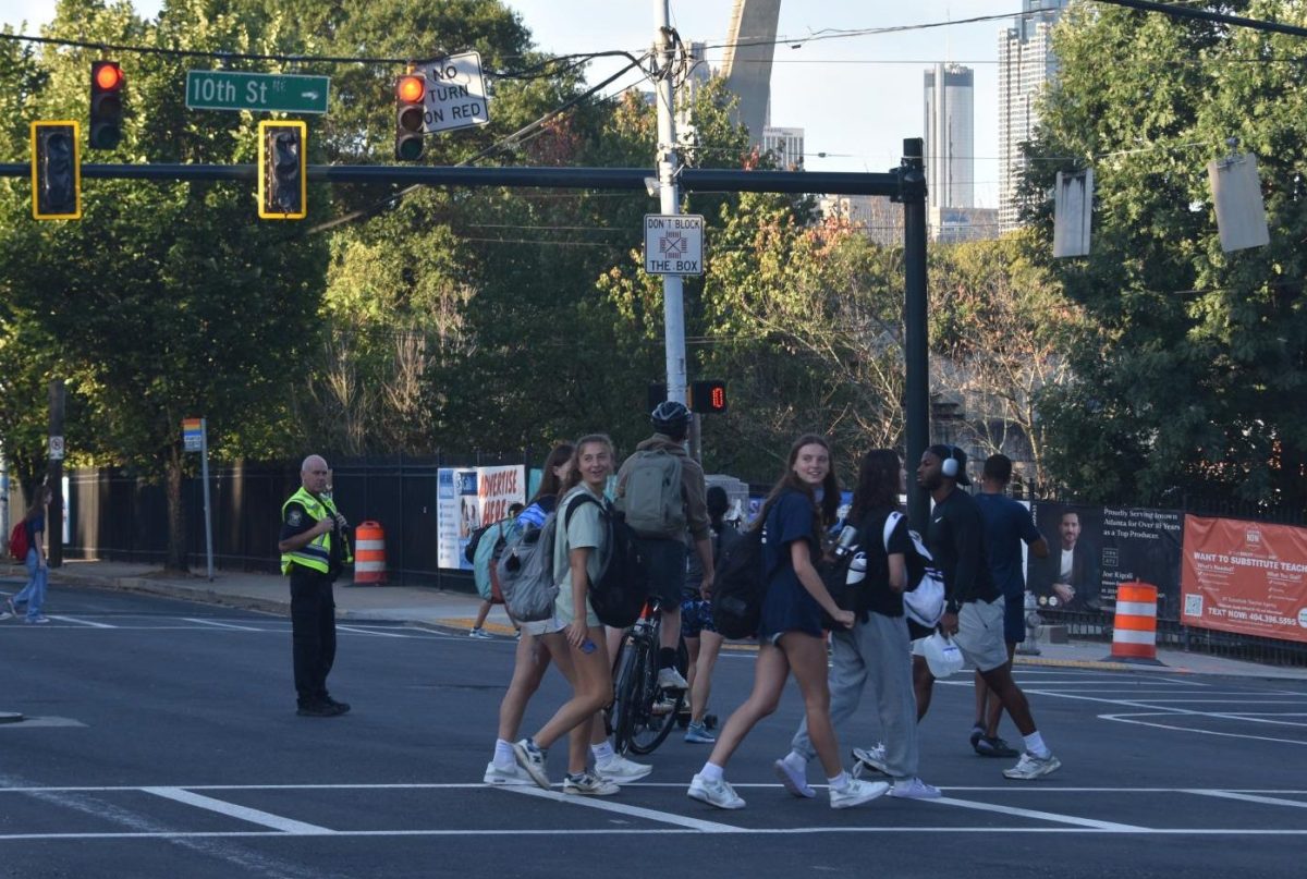 During periods of heavy pedestrian traffic, around arrival and dismissal times at Midtown, the BeltLine and Atlanta Police Department have stationed crossing guards, as part of the APD Path Force, to ensure pedestrian safety while the intersection is still under construction.