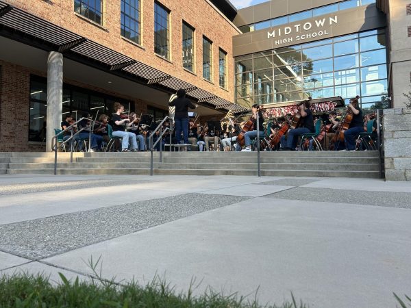 In front of the breezeway, the orchestra played on top of the steps, which served as their temporary stage