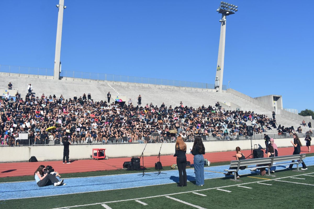 March For Our Lives leaders juniors Kate Krugman and Audrey Lyons speak on Sept. 20 at the Midtown High School walk out in support of gun control.