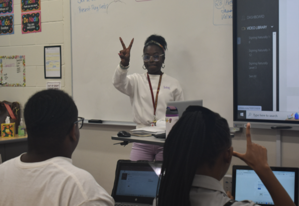 American Sign Language teacher Labreshia Lee focuses on creating an effective learning environment for students by incorporating engaging projects and student collaboration.