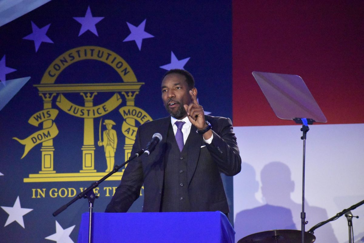 NOT GOING BACK: Mayor Andre Dickens told the crowd to keep phone banking, canvassing and making sure friends and family vote tomorrow to make sure Georgia stays blue.