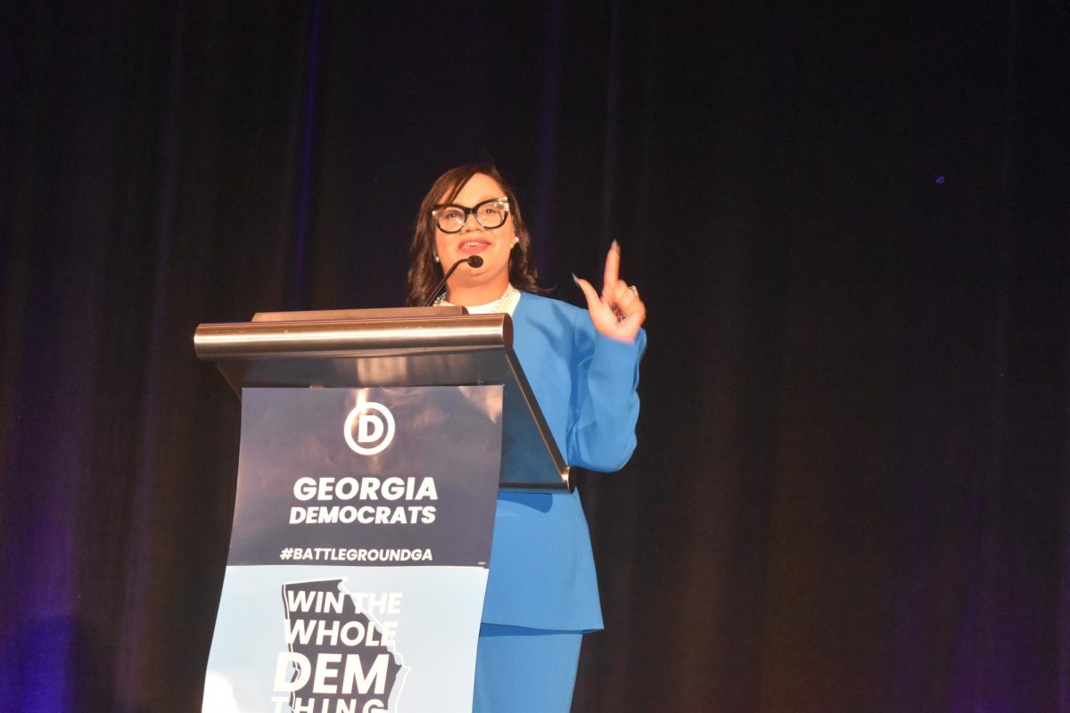 EARLY HOPE: Around 8 p.m. Nikema Williams, the District 5 U.S. Representative, took the stage. Trump already had a small lead; Williams speech attempted to boost morale. Williams won reelection for her district.