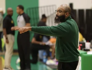 Head coach Evan Jefferson instructs Dublin High School players. Jefferson was head coach of Dublin’s girls team from 2020-24. This year, at Midtown, is Jefferson’s first time as a head coach for a boys team. In the 2023-2024 season, Jefferson led Dublin to the Sweet Sixteen.