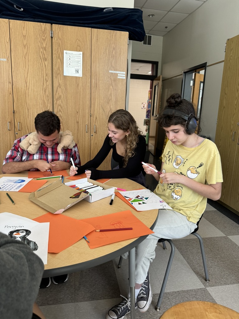 Lola Lignugaris (middle), co-president of international non-profit Best Buddies Club leads an arts and crafts activity with students
Connor Vinson (left) and Darby Whitman (right). This volunteer organization strives to create opportunities for one-to-one friendships and inclusivity.