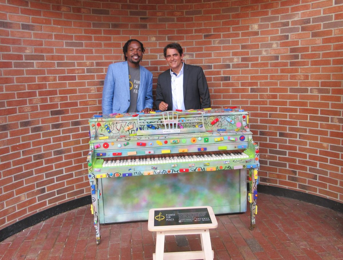 Malek Jandali (right), international composer, founded Pianos For Peace in 2015 with help from community outreach manager Ameer Muhammad (left), creating one of the largest public art displays in Georgia.