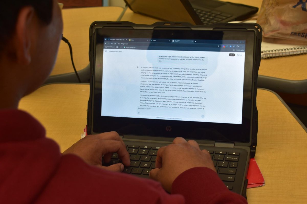 Sophomore Yahir Morales uses generative AI ChatGPT as part of an AI-assisted creative writing project for his Speech/Forensics III class. In several classes, teachers are incorporating artificial intelligence into learning through assignments and projects.