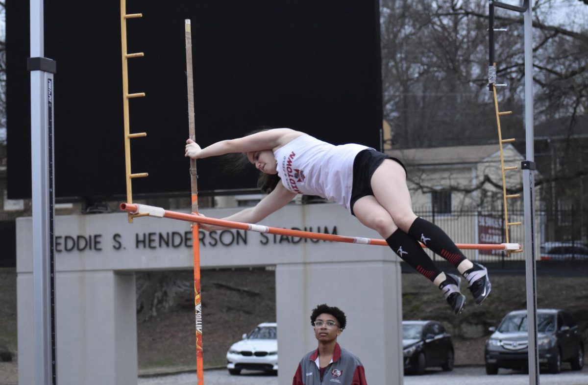 Junior Nadia Jurkovic pole vaults in the Midtown Opener last season on Feb. 27. Under the changes to the spring sports start date, spring sports like track and field and soccer are not allowed to practice as a team using equipment like poles until Jan. 27 instead of Jan. 8 like previous years.