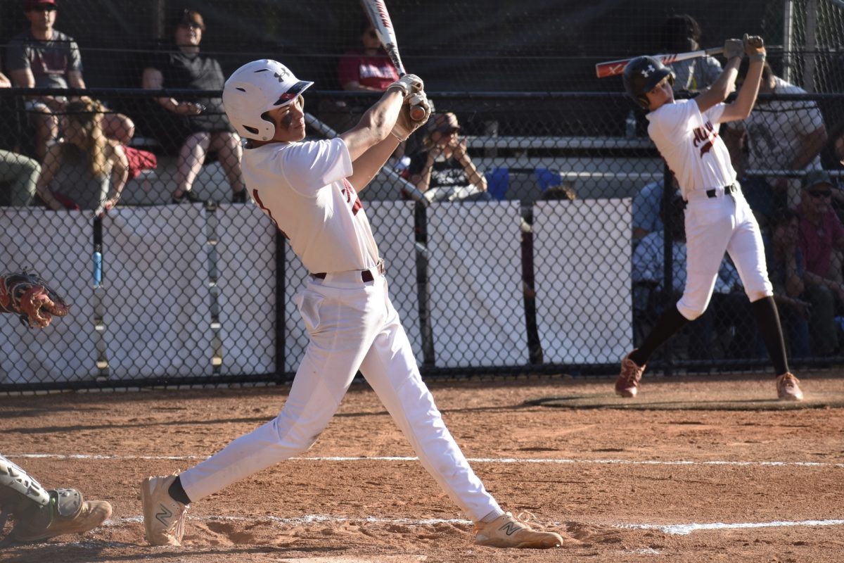 Junior shortstop Neil Sevigny hits a single in the sixth inning of the Knights' 5-4 win against Jackson. Sevigny went on to steal second base and score the game-tying run later in the game.