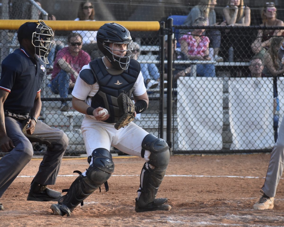 Senior Taylor Goldstein prepares to throw to second base to catch a Jaguars player stealing. Goldstein led the team in home runs and on-base percentage which led him to be selected to the all-region team.