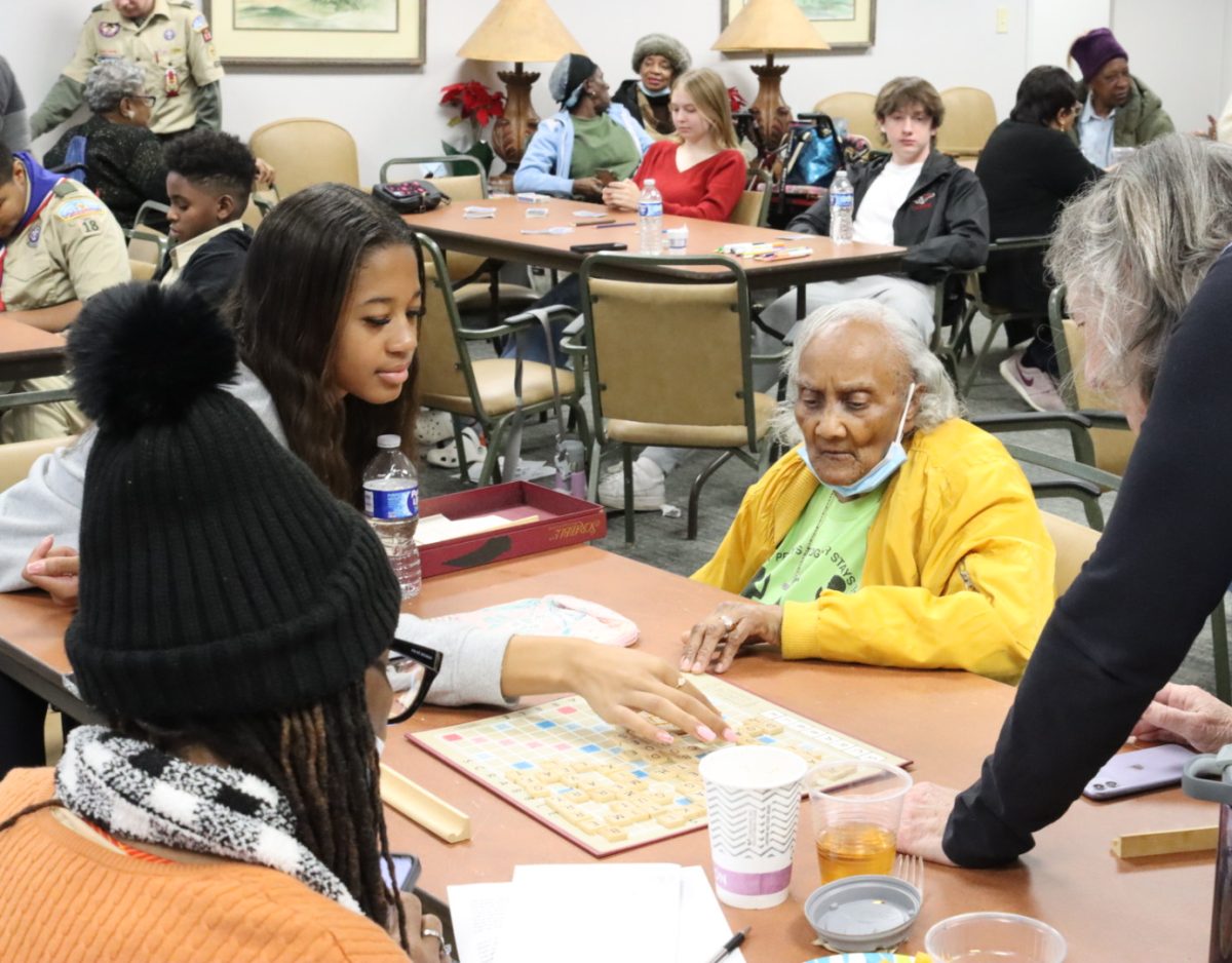 COMMUNITY INVOLVEMENT: Senior Devon DuBose volunteered at the Branan Towers retirement community as part of 21 Club's annual MLK Day service activity.