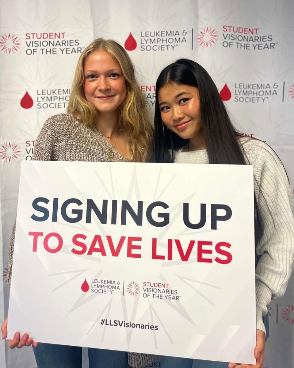 SAVING LIVES: Co-Founders of Midtown Knights for the Fight junior Ava Anderson
(left) and sophomore Kai Chen (right) are pictured at the LLS Visionary Event.