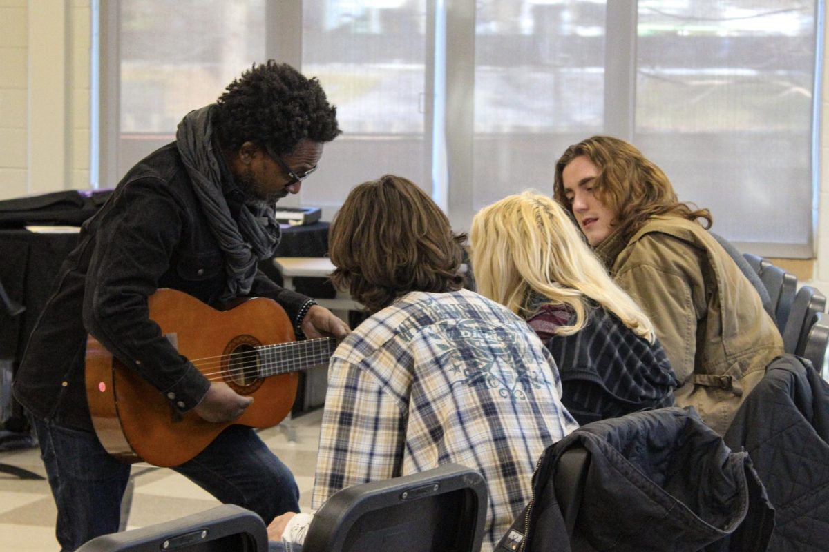 STUDENT SONGS: Midtown students participate in the Jan. 9 workshop with professional recording artist David Ryan Harris. These workshops offer feedback for students to help them build skills.