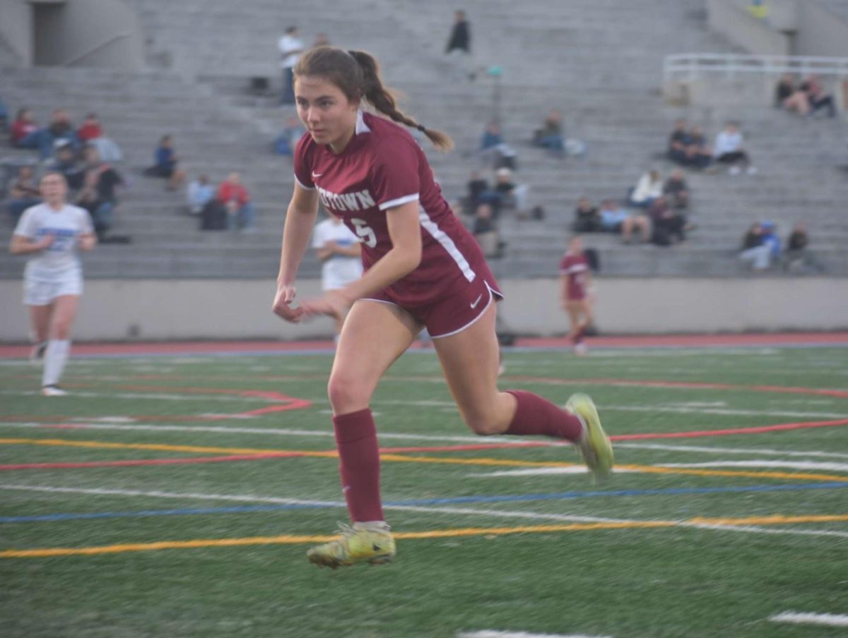 In a close game against Lovett on Feb. 10, senior Abby Ippen chases after the ball, the Knights ended up losing 2-0.