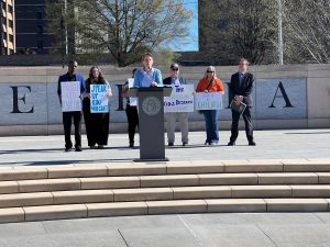 CAPITOL STEPS: Midtown principal Dr. Betsy Bockman, gives a speech on the steps outside of the Georgia State Capital to advocate for foster care rights. CREDIT: Dr. Betsy Bockman